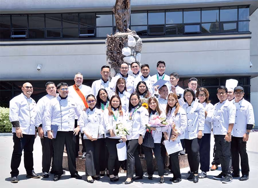 The recent batch of graduates of the Diploma in Culinary Arts and Technology Management course with their chef instructors at the new CCA BGC campus.