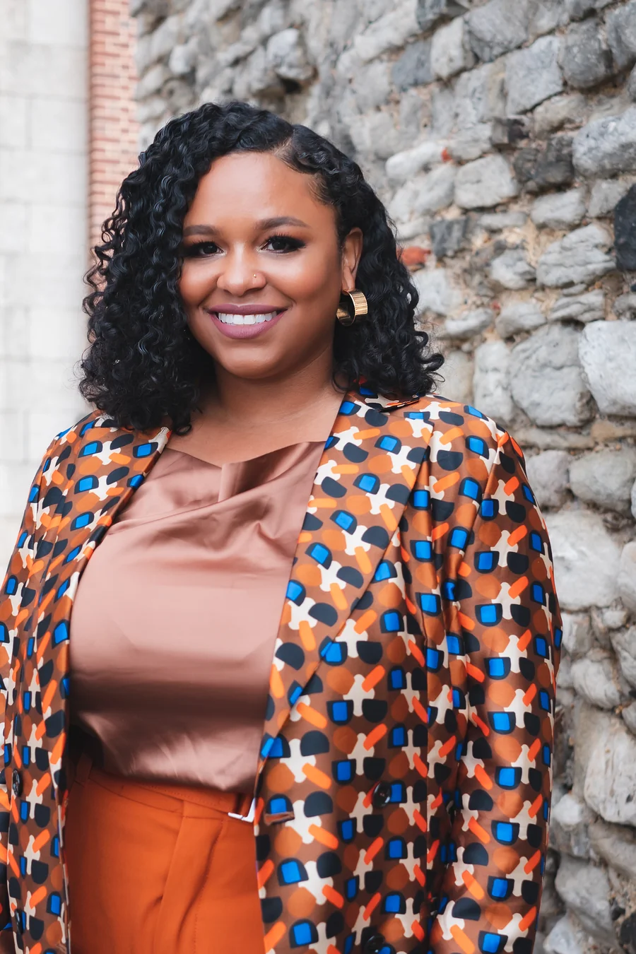 Headshot of Asia Orangio, founder of DemandMaven