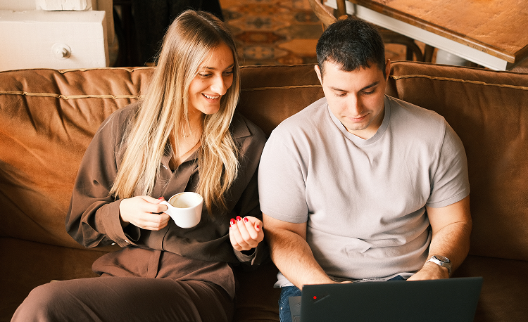 wooden trey with tea leaves in a white cup