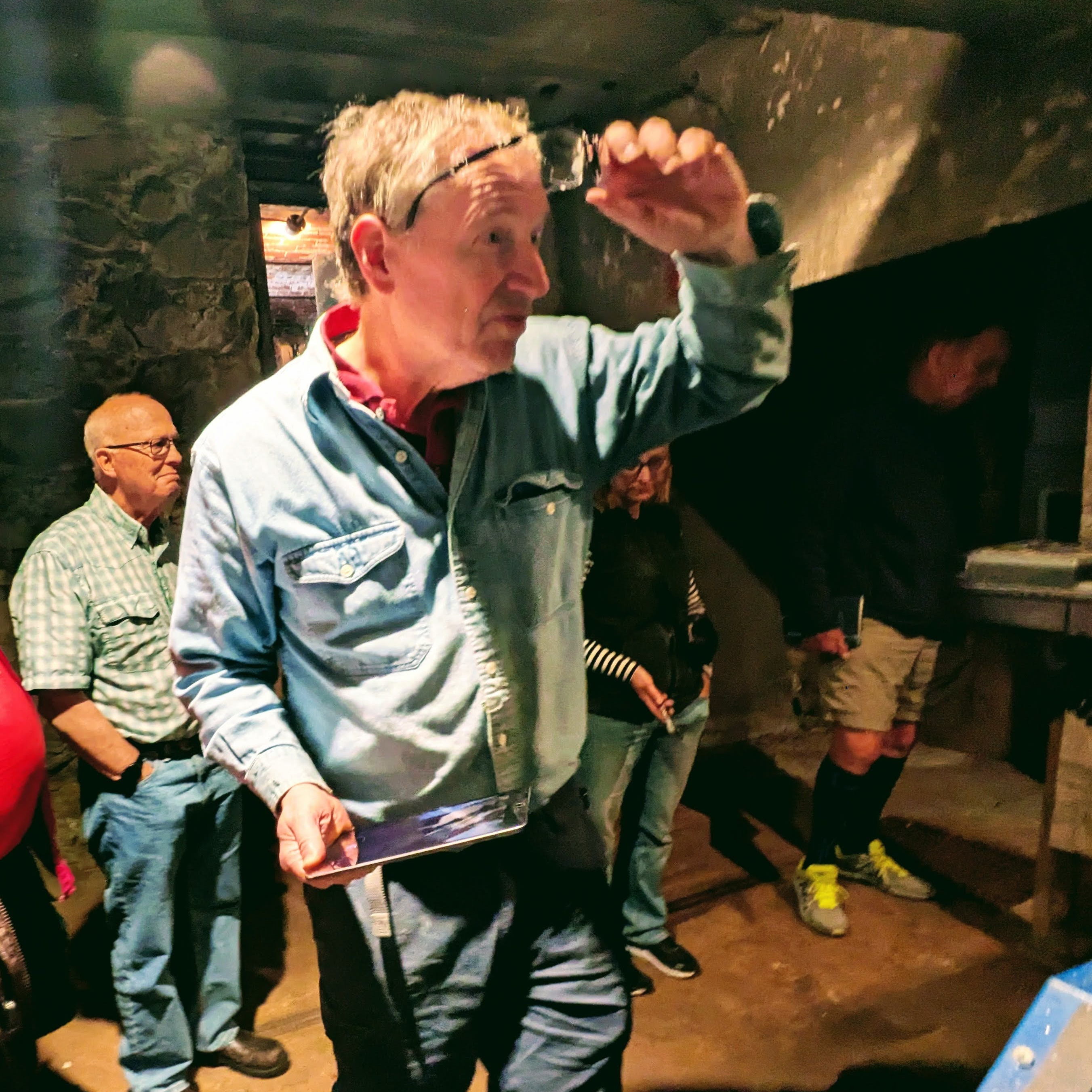 Jim Nail conducts an Environmental Stewardship Assessment in a church basement.