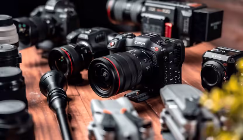 a group of cameras on a table