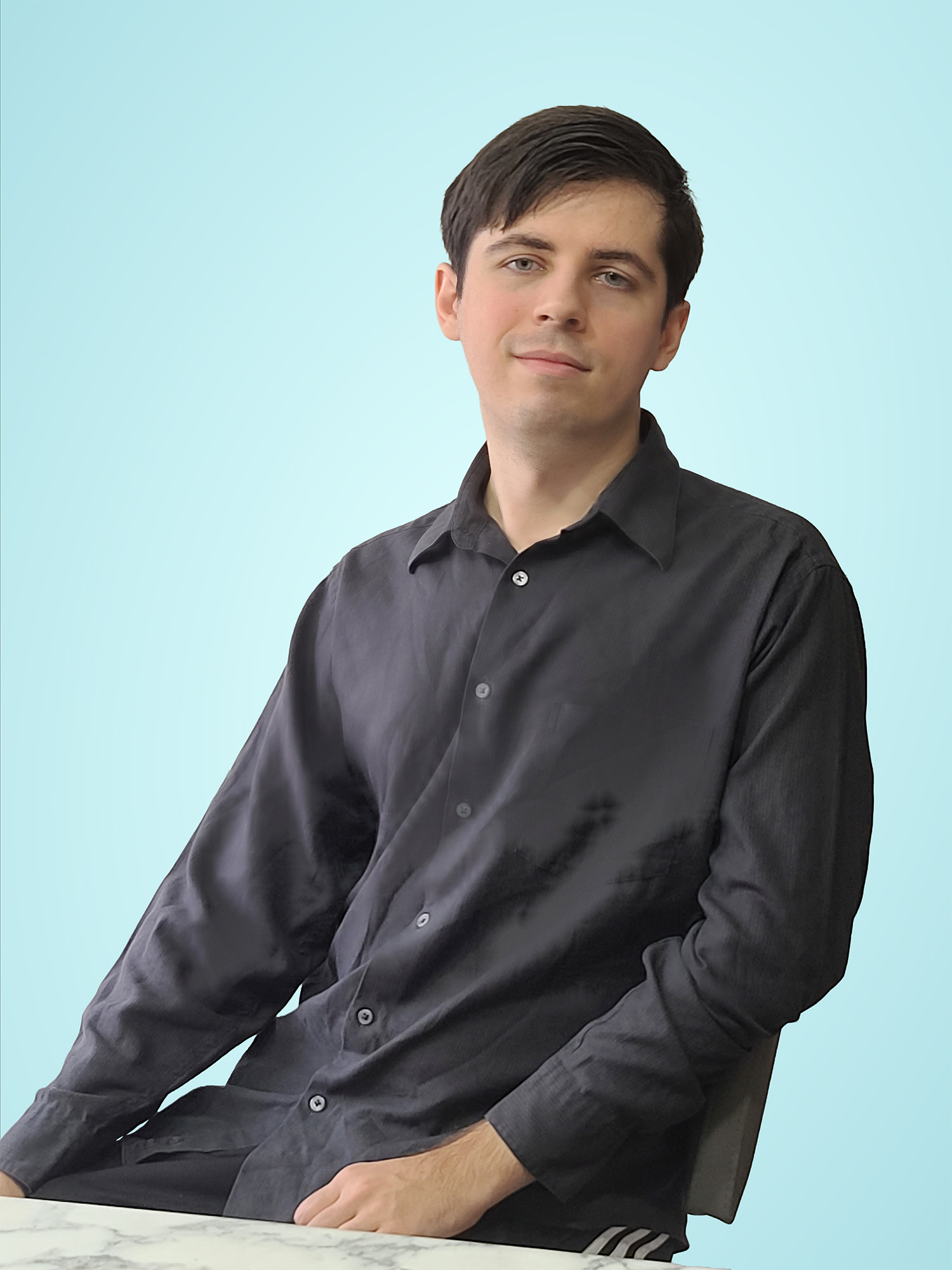 A photo of me leaning back in a chair.