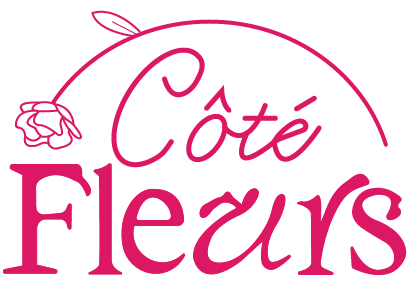 Cote in a cursive font and fleurs underneath it with a pretty serif font. Framing the top of the words is a half circle flower, looks like a carnation flower 