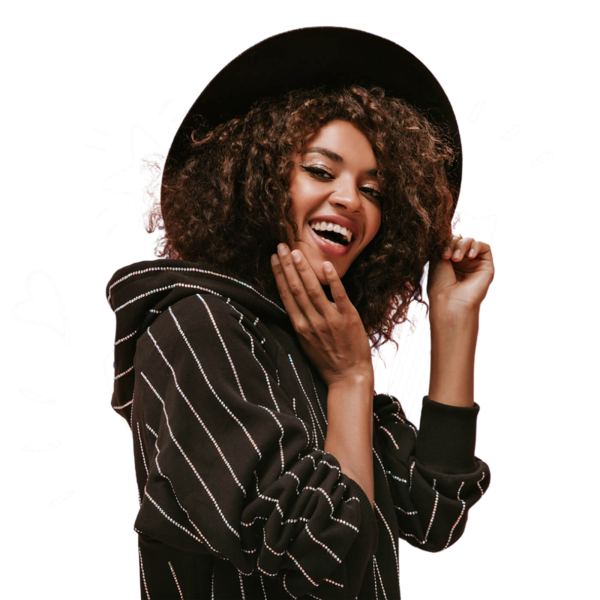 Smiling woman with curly hair wearing black striped hoodie and hat on a transparent background.