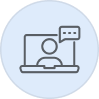 Icon of a user on a laptop screen with a speech bubble, symbolizing online communication.