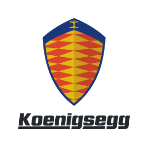 Koenigsegg emblem with a blue and gold shield featuring a red and gold patterned interior and a small gold symbol at the top, above the Koenigsegg name in bold black italic letters.