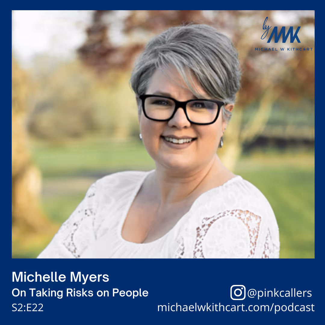 Smiling woman with short gray hair and black glasses wearing a white lace top outdoors, with podcast info text below.