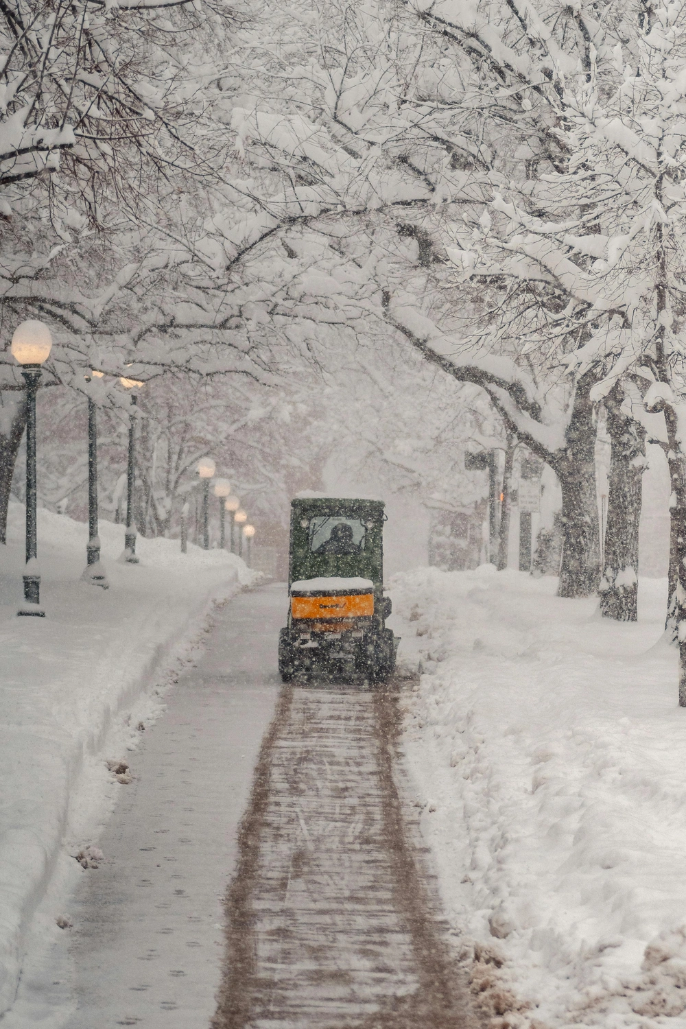 Driveway and sidewalk clearing by Sunrise Lawn & Snow
