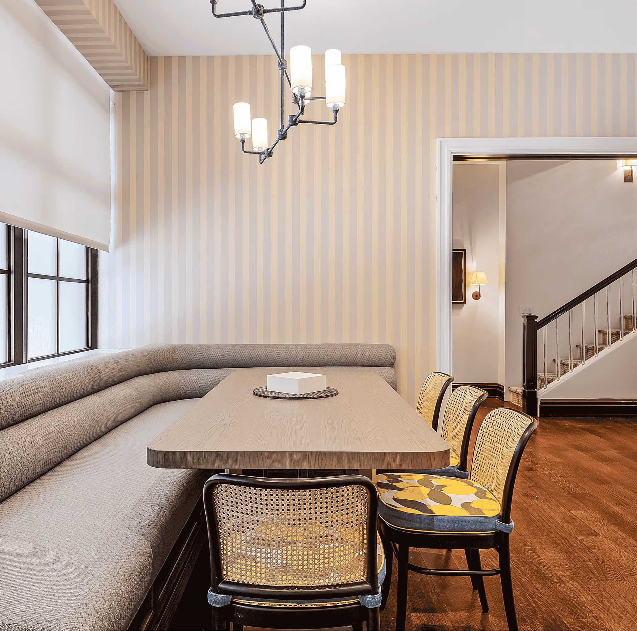 Luxury New York City living space renovation with bespoke furniture, modern lighting, and elegant interior detailing by Prime Renovations.