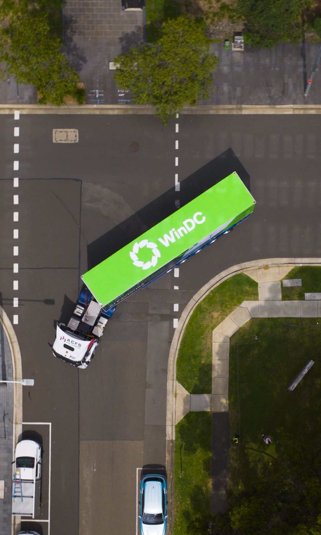 Aerial view of a WinDC portable data centre being delivered by truck