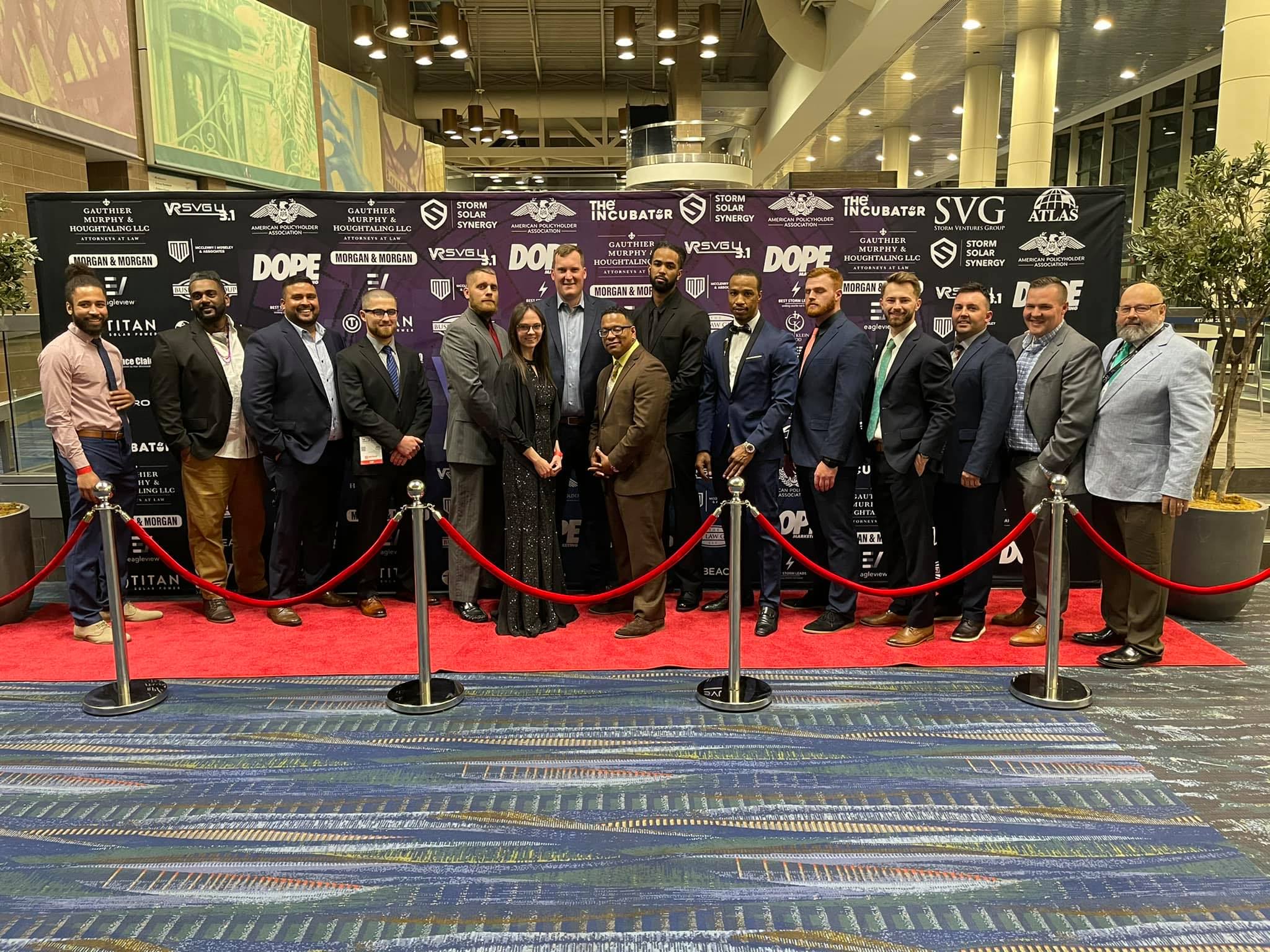 Patrick Martin standing with his construction team at an industry conference, reflecting the real-world operations and leadership behind Remodlr.