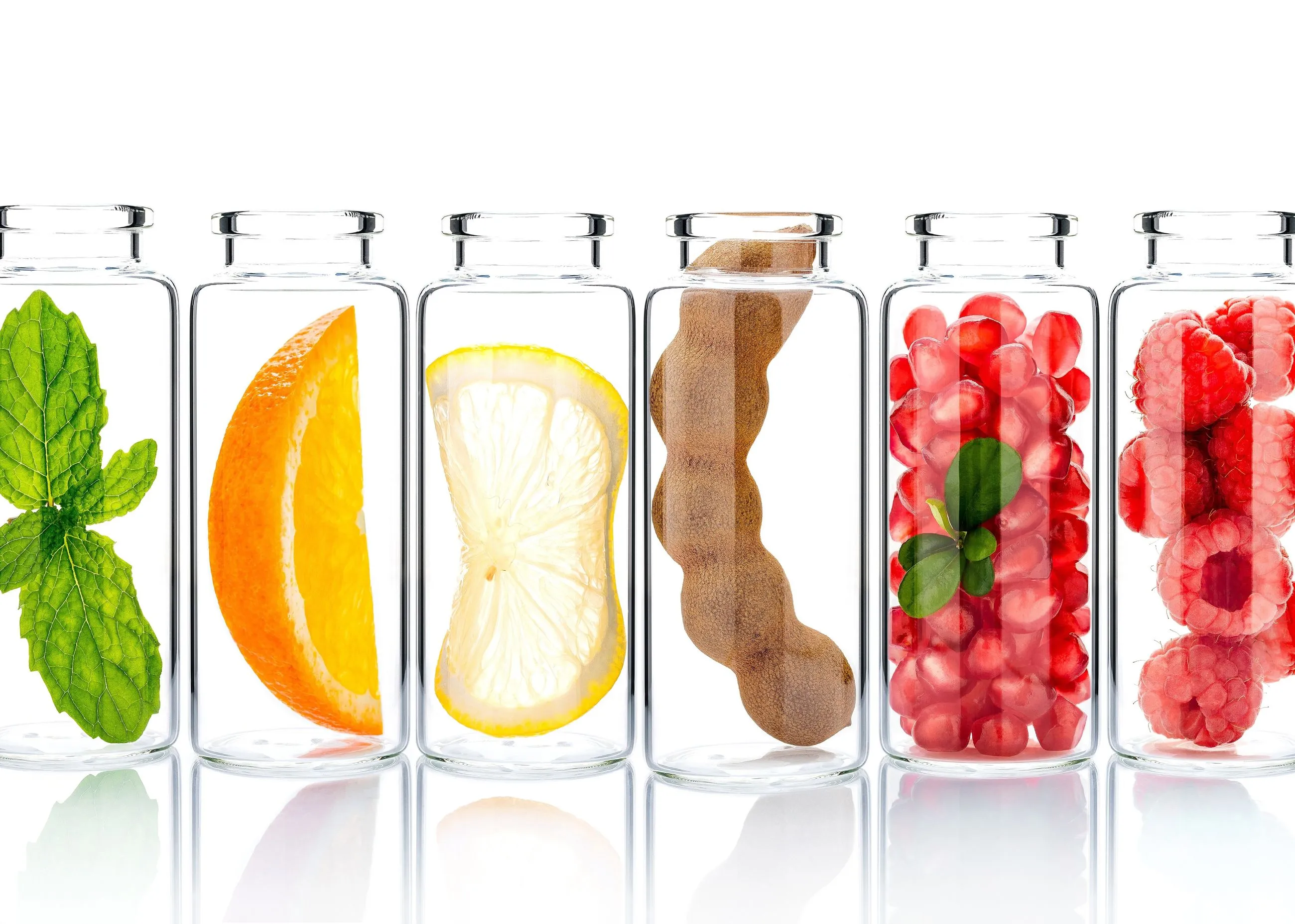 Fruits and vegetables in a vials