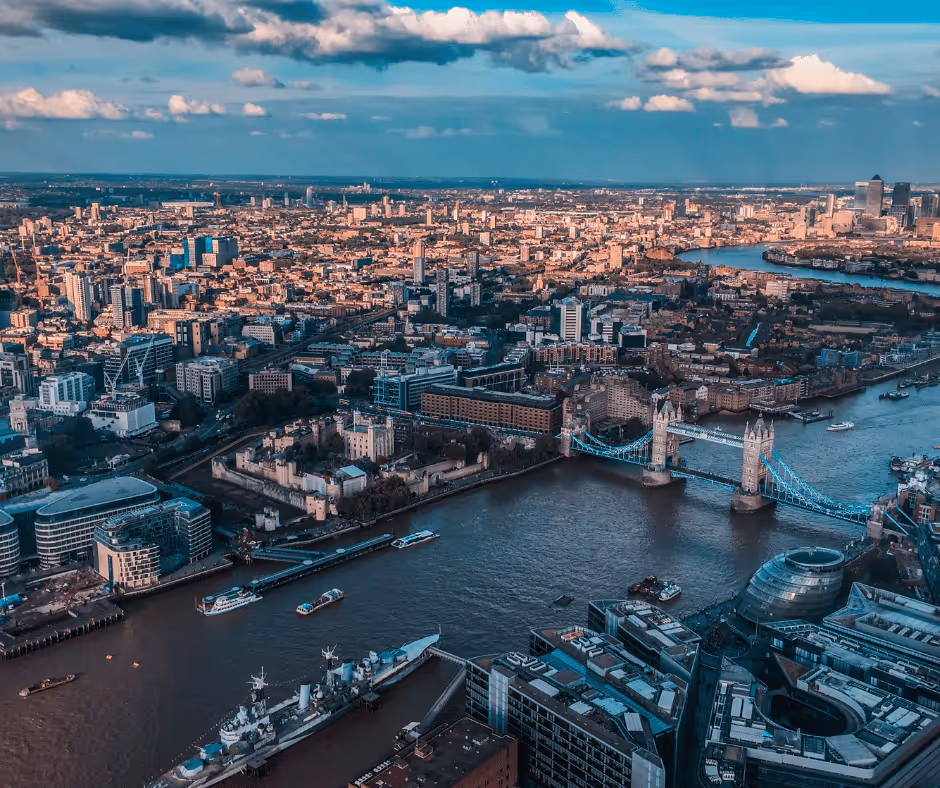 Abstract grayscale fluid marble texture with flowing lines and soft gradients.