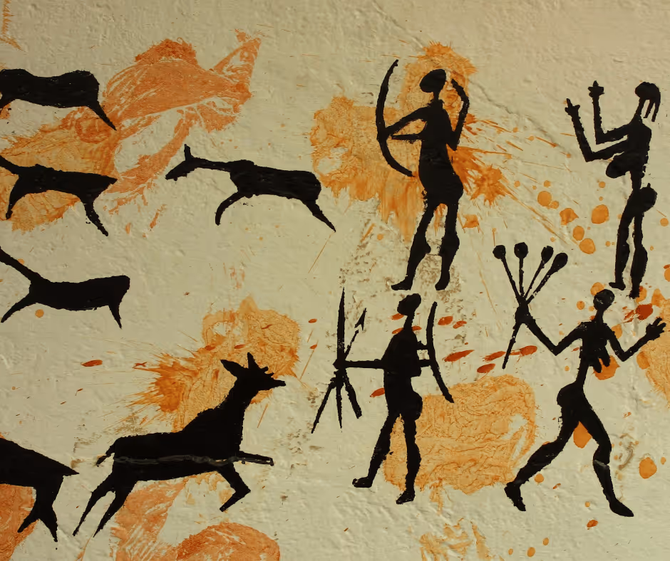 Mist-covered river winding through lush green forested hills at dawn.