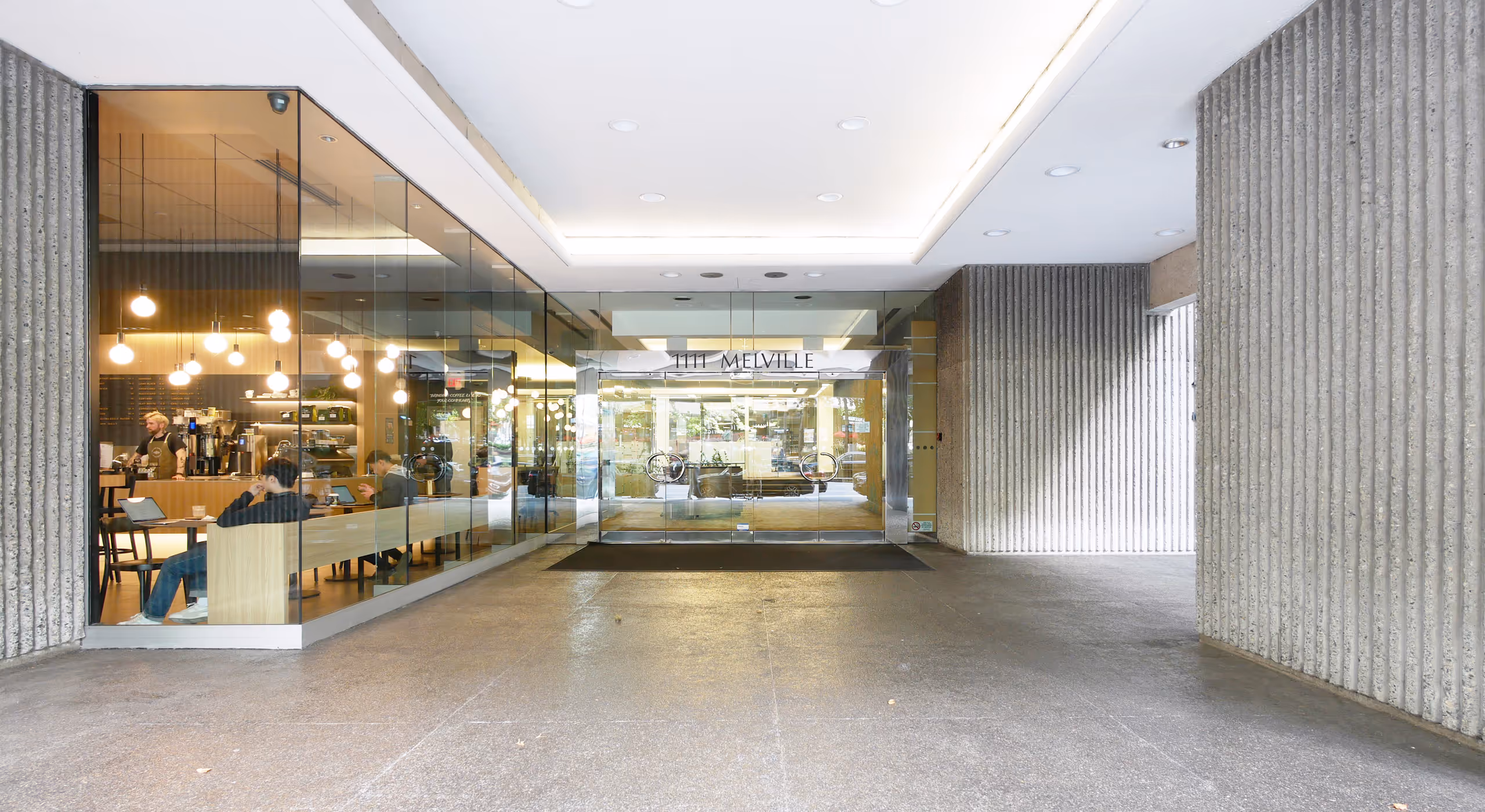 Lobby entrance perspective at 1111 Melville multi-tenant commercial building.