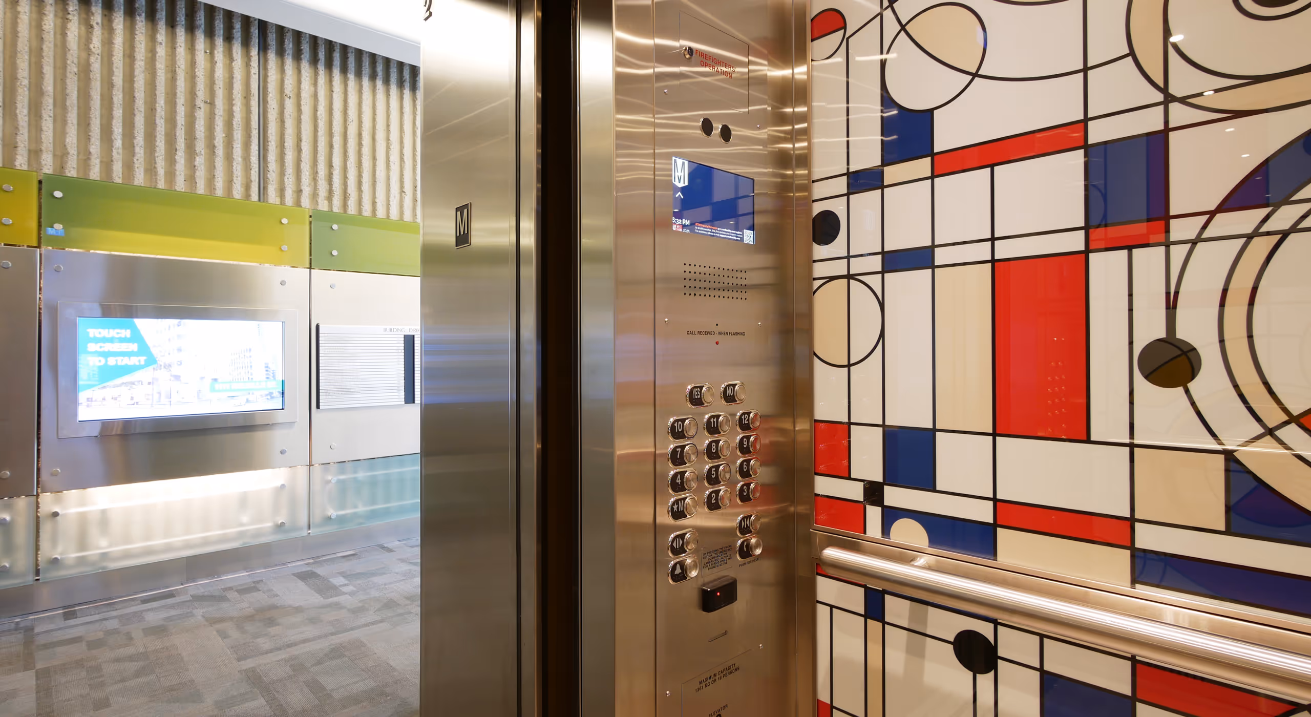 Elevator interior at 1111 Melville commercial tower featuring lighting, finishes, and control panel.