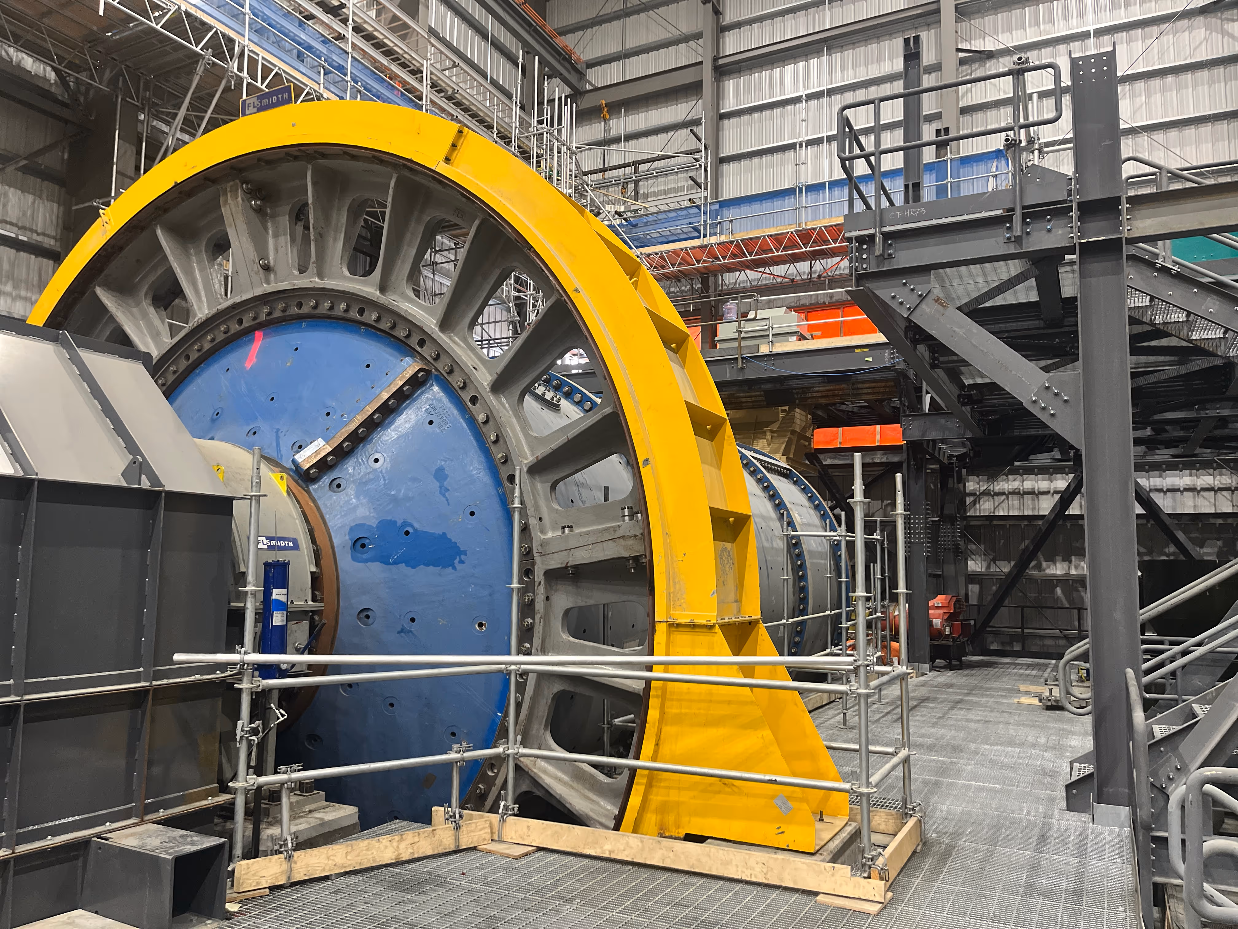 Detail view of large rotating equipment inside Goose Lake industrial building.
