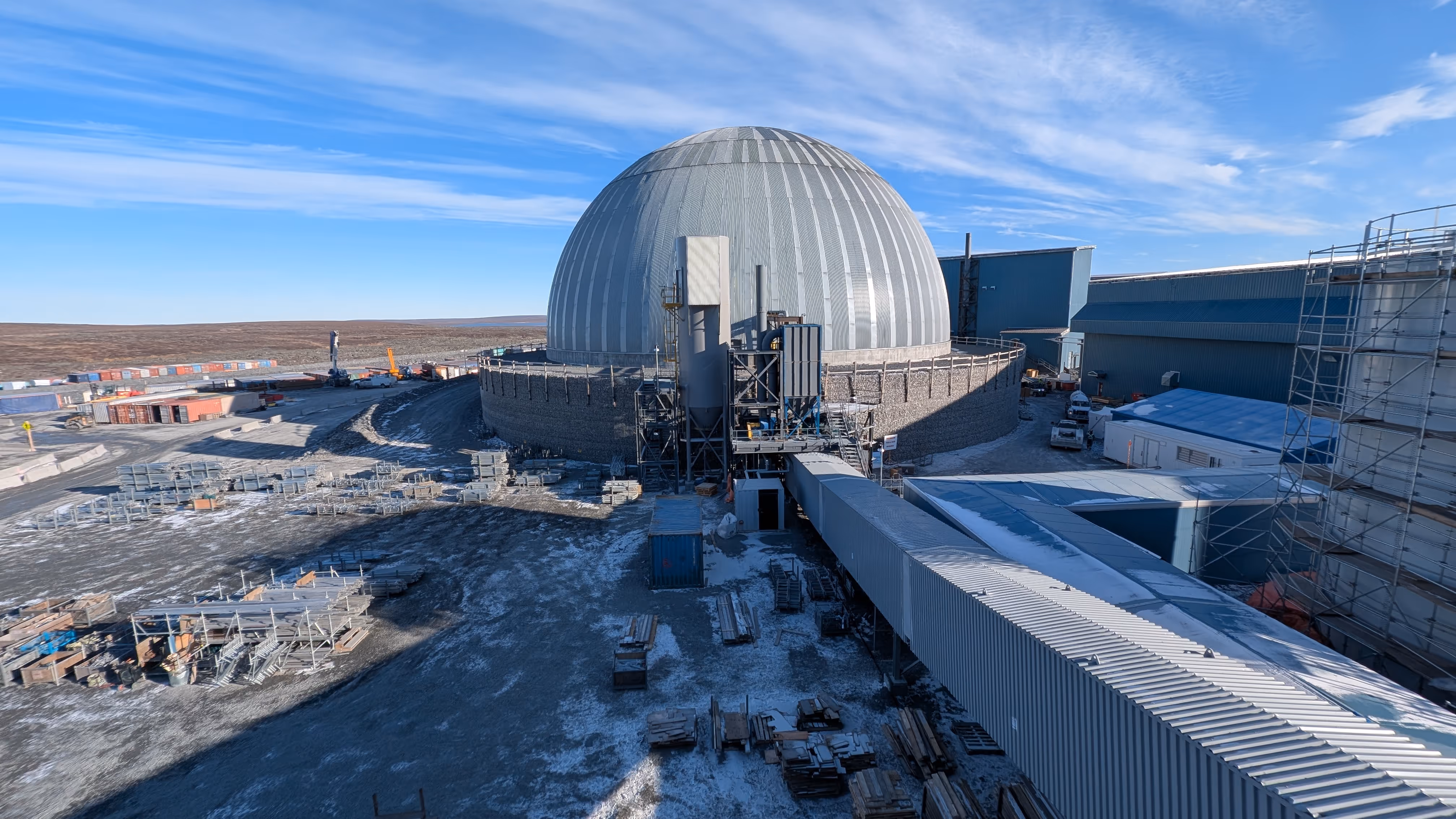 Exterior view of domed structure and service building at Goose Lake industrial site.