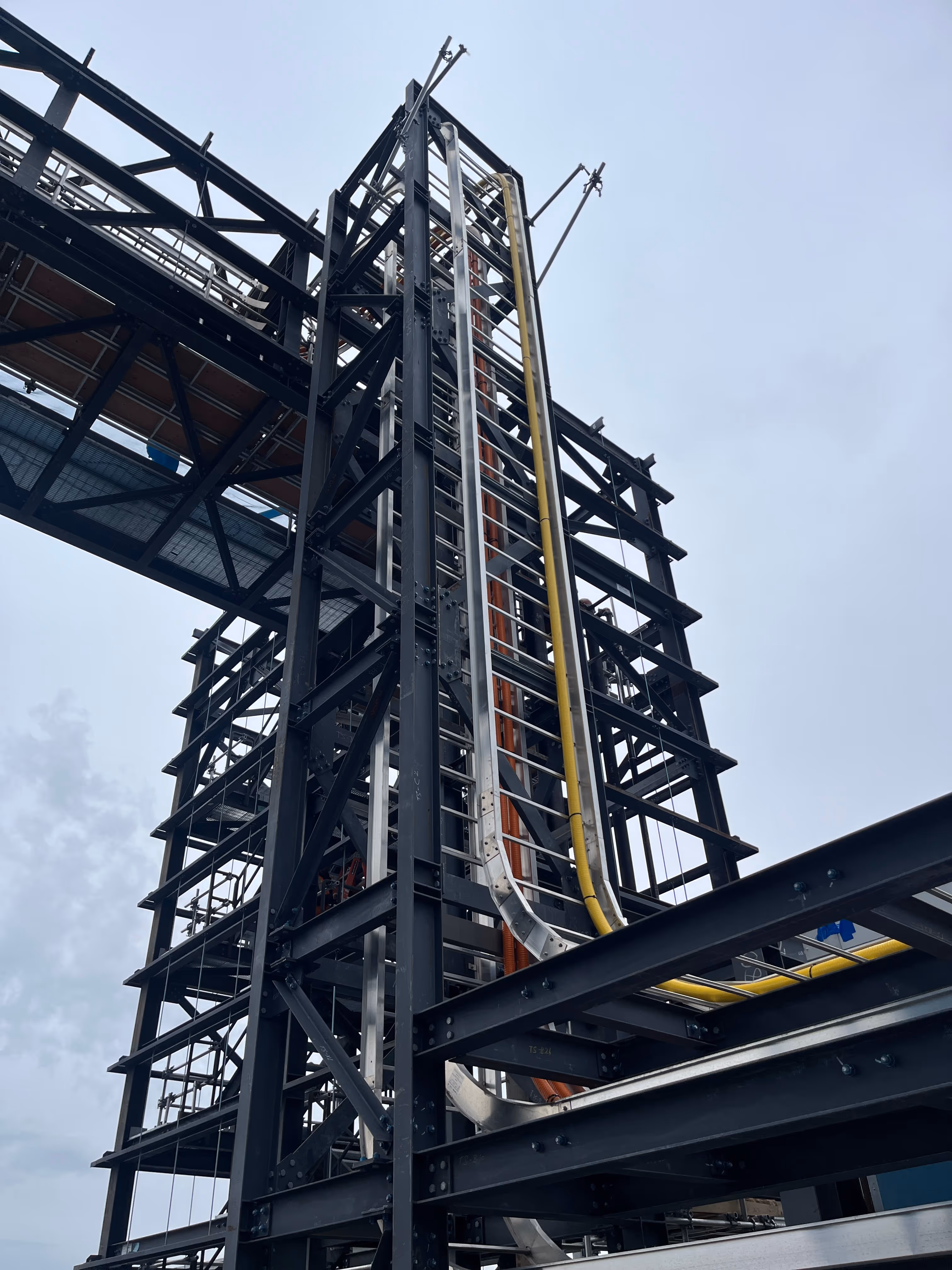 Cable trays and service routing installed on steel structure at Goose Lake industrial site.
