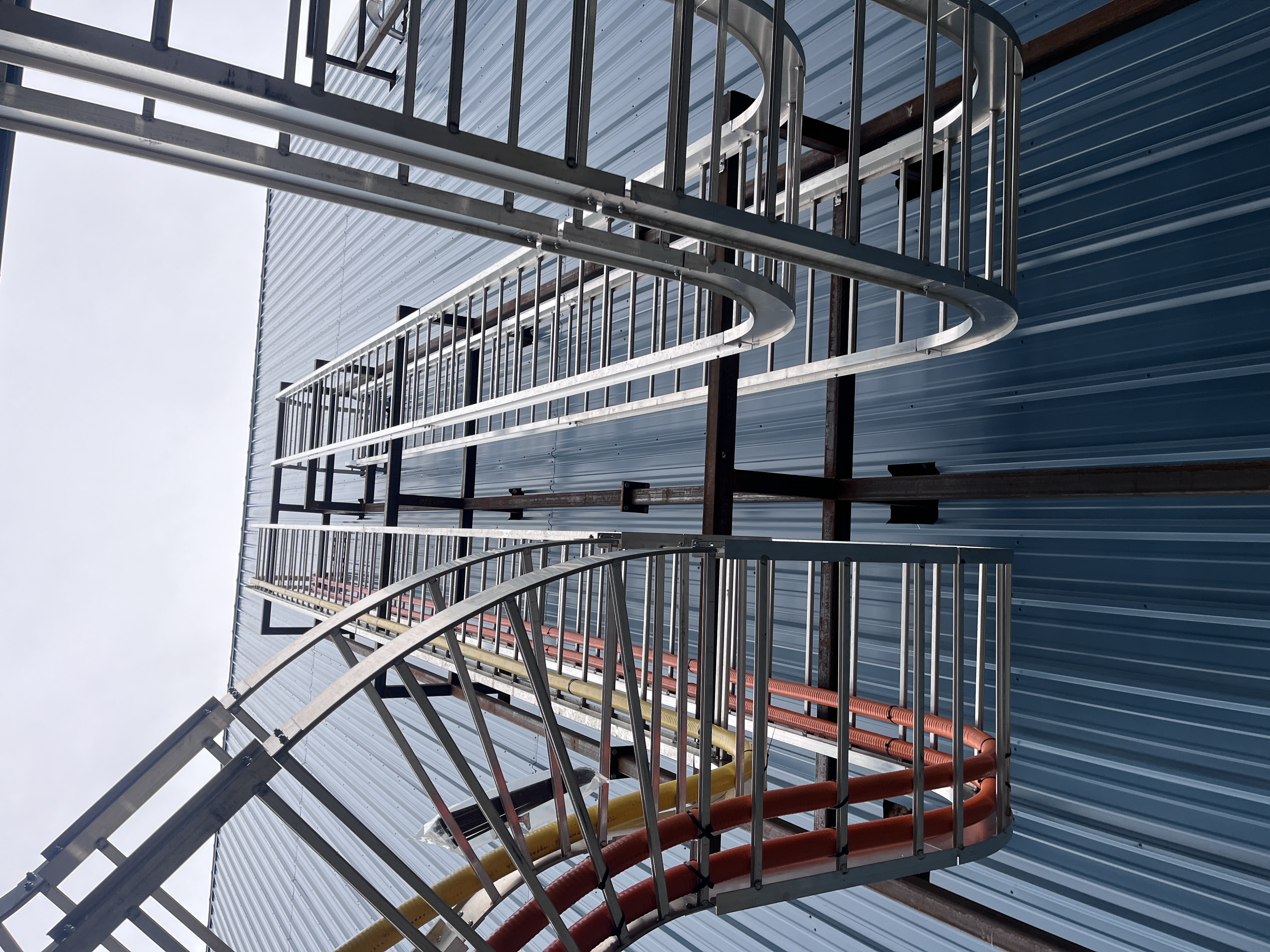 Structural steel framing with service routing at Goose Lake processing facility.