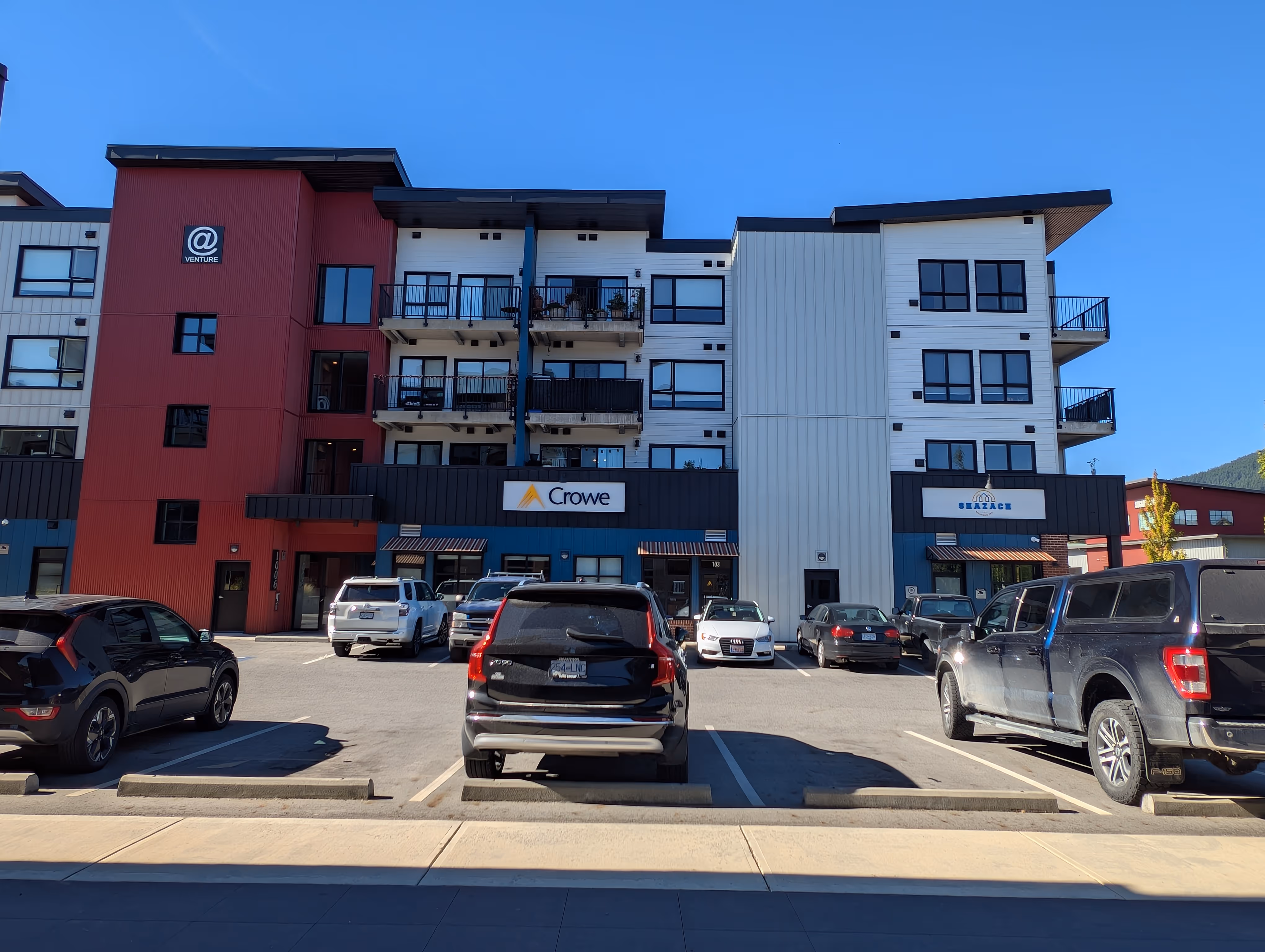 Central landscaped courtyard at Venture Industrial Village with site lighting and electrical services supporting mixed-use operations.