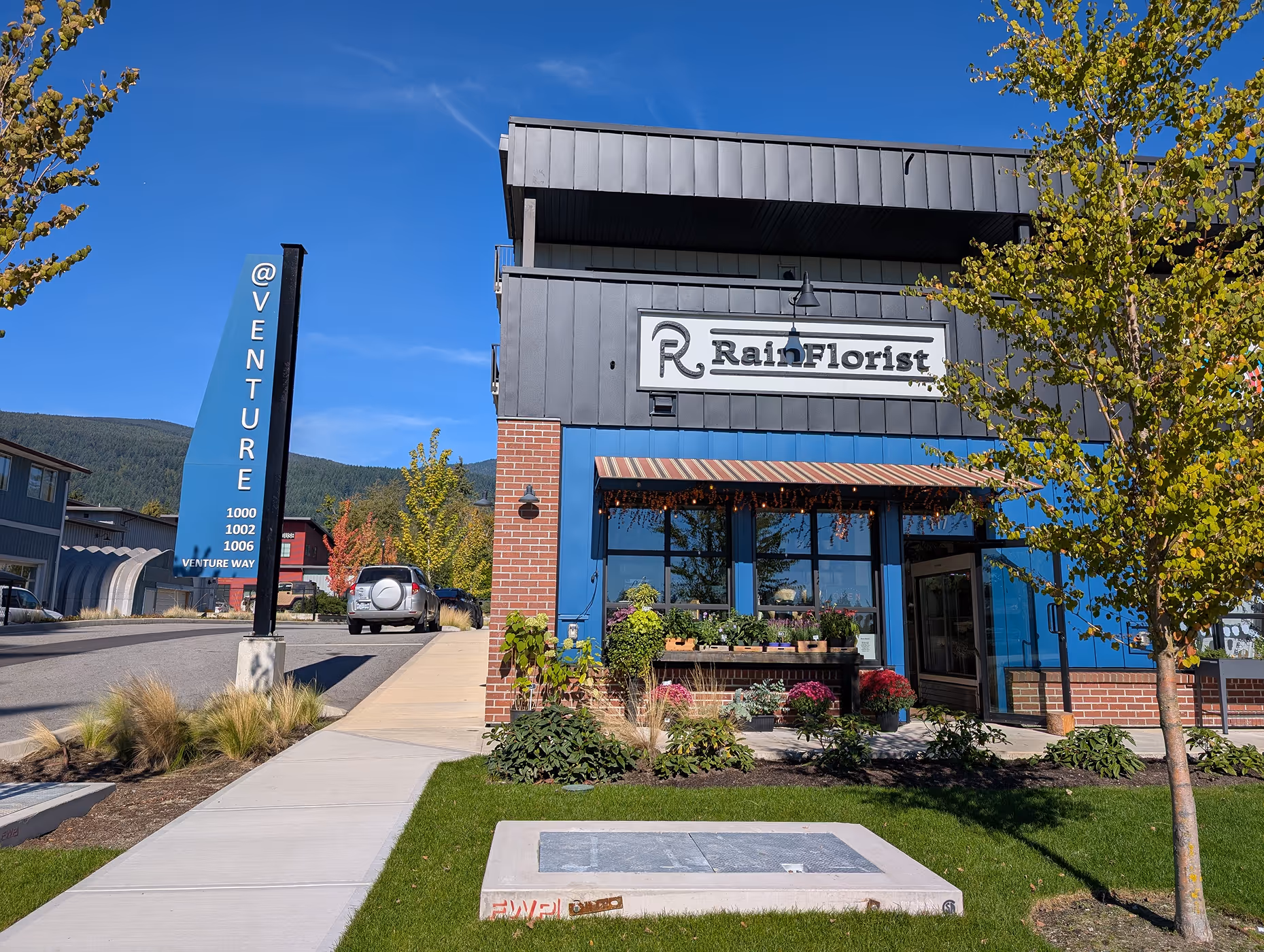 Finished Venture Industrial Village with residential apartments and ground-floor commercial units supported by WEE electrical design.