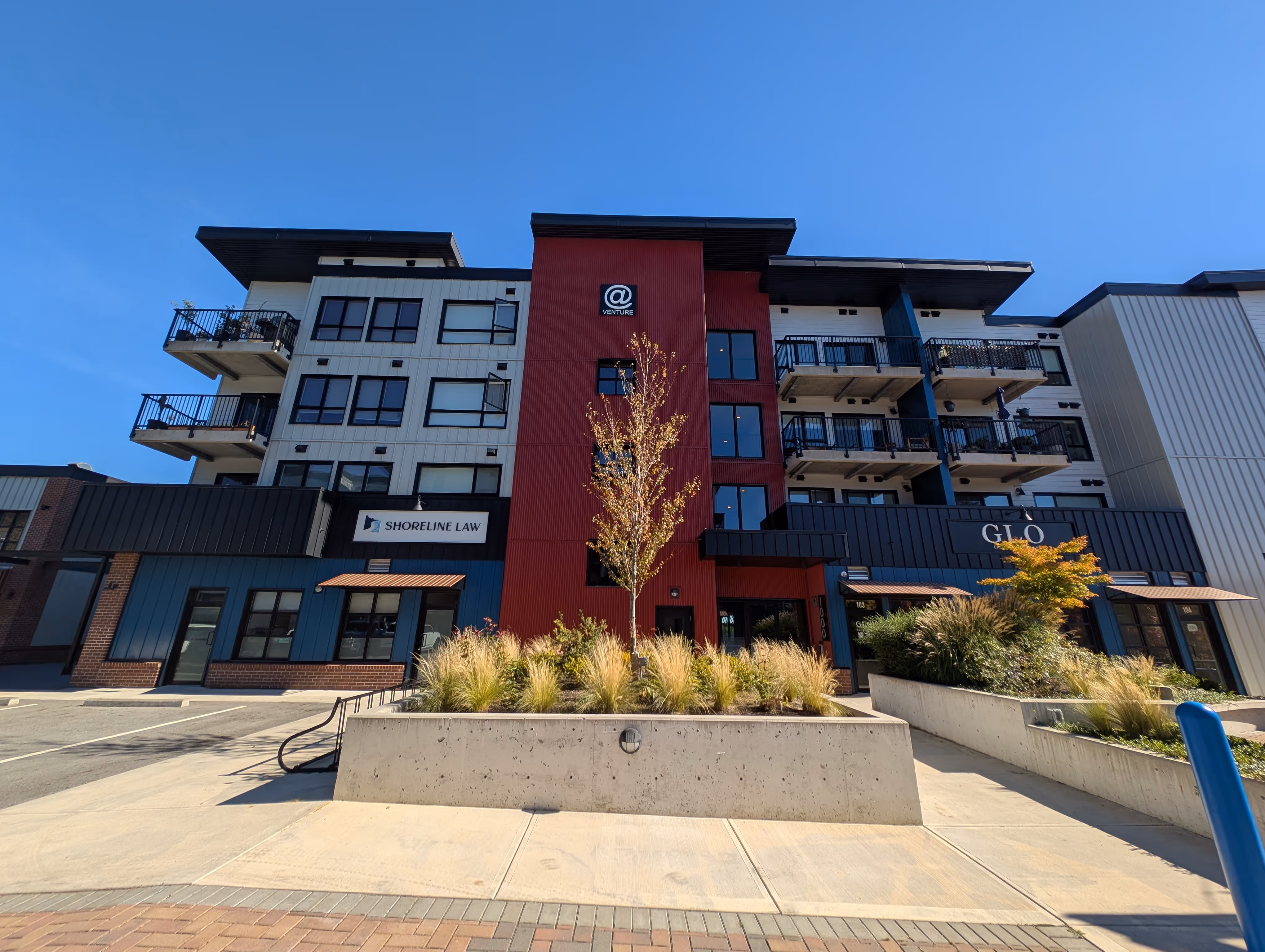 Central landscaped courtyard at Venture Industrial Village with site lighting and electrical services supporting mixed-use operations.