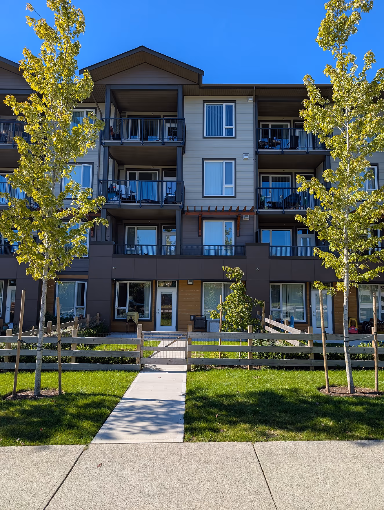 Main entrance elevation of Shaw Road apartment building with electrical design and life-safety systems integration