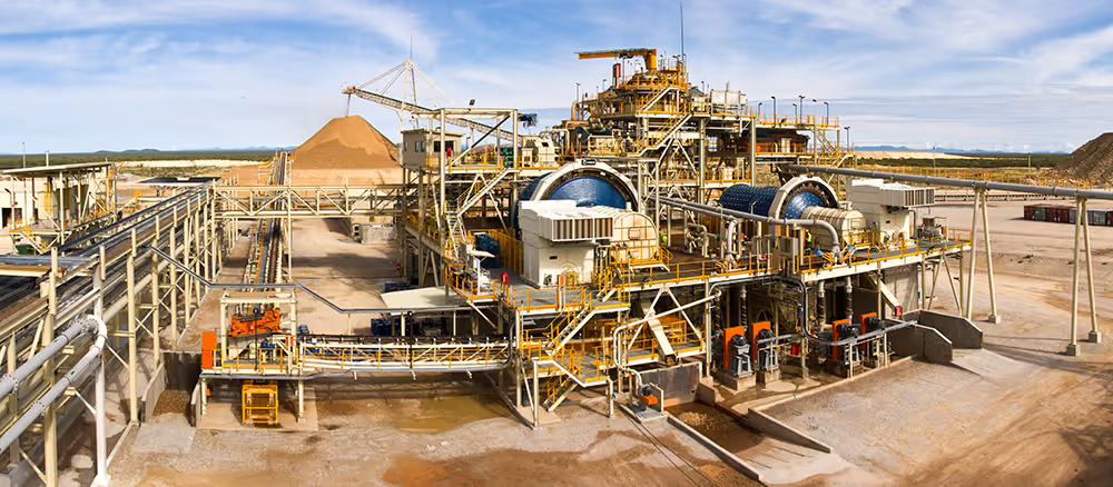 Processing plant at the Otjikoto Gold Mine in Namibia with large-scale industrial equipment and conveyor systems