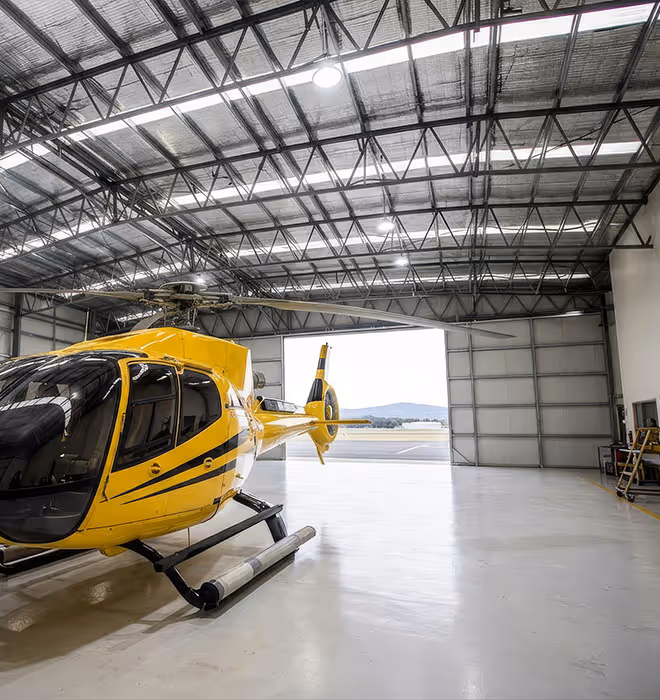 Completed cyclone-rated helicopter hangar with full open-span access in Exmouth, Western Australia.