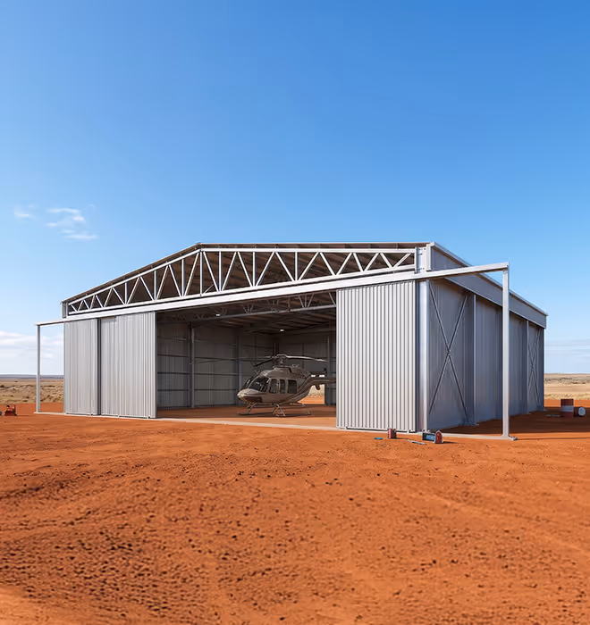 Triple-stacked sliding doors during construction of the Corsaire helicopter hangar in Exmouth.