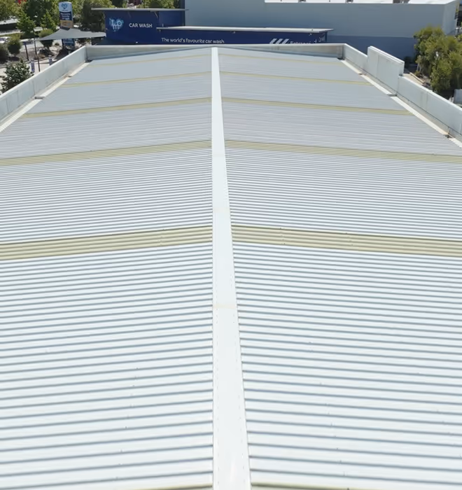 Completed Galvins Plumbing trade hub with composite cladding and brick veneer facade in Ellenbrook, Western Australia.