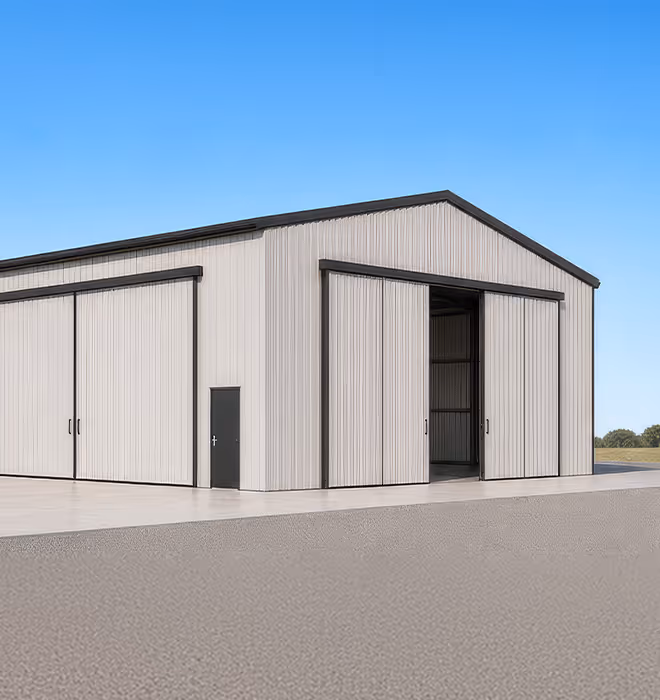 DLR Building cyclonic workshop showing double-stack sliding doors during construction.