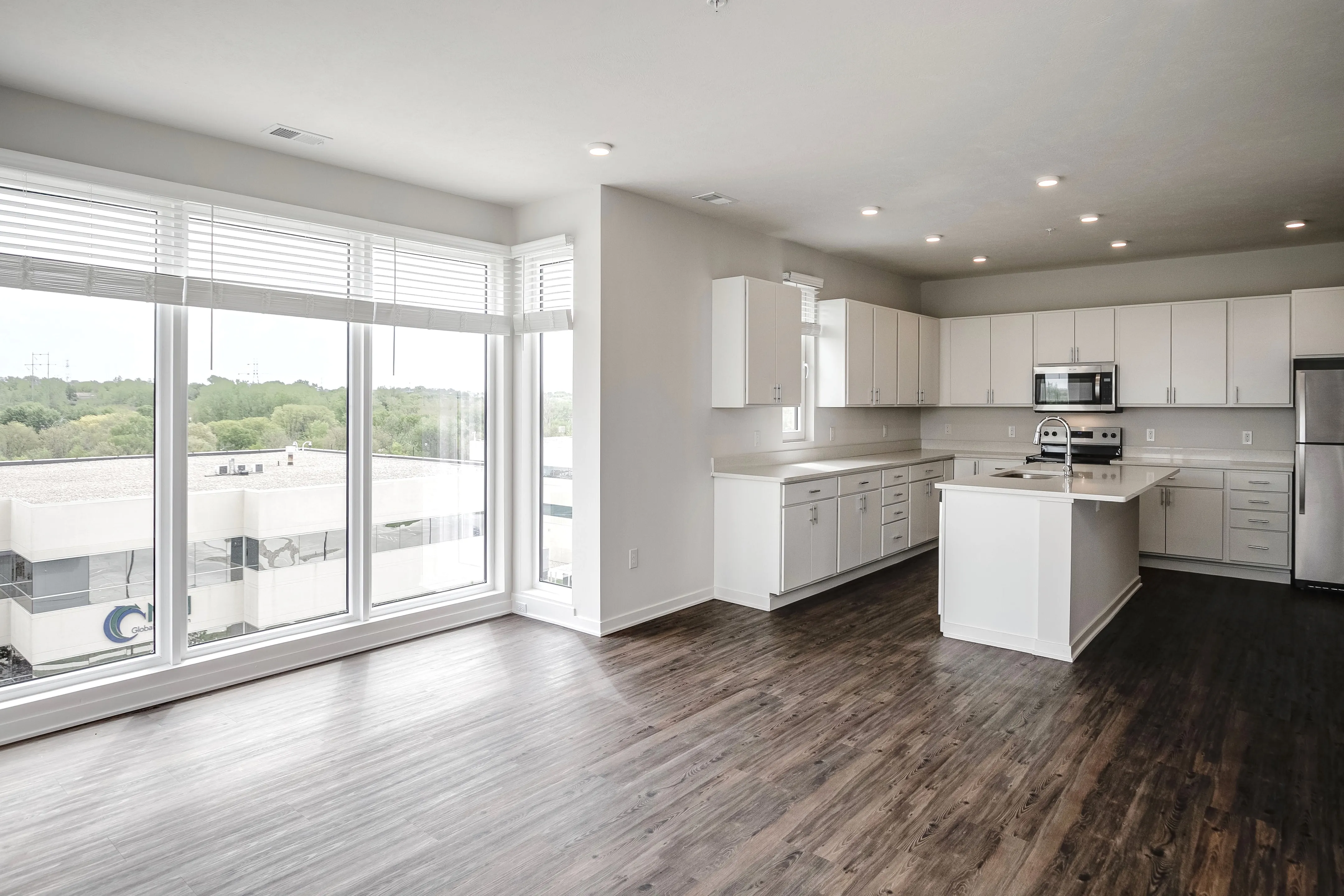 Kitchen with view of empty dining room