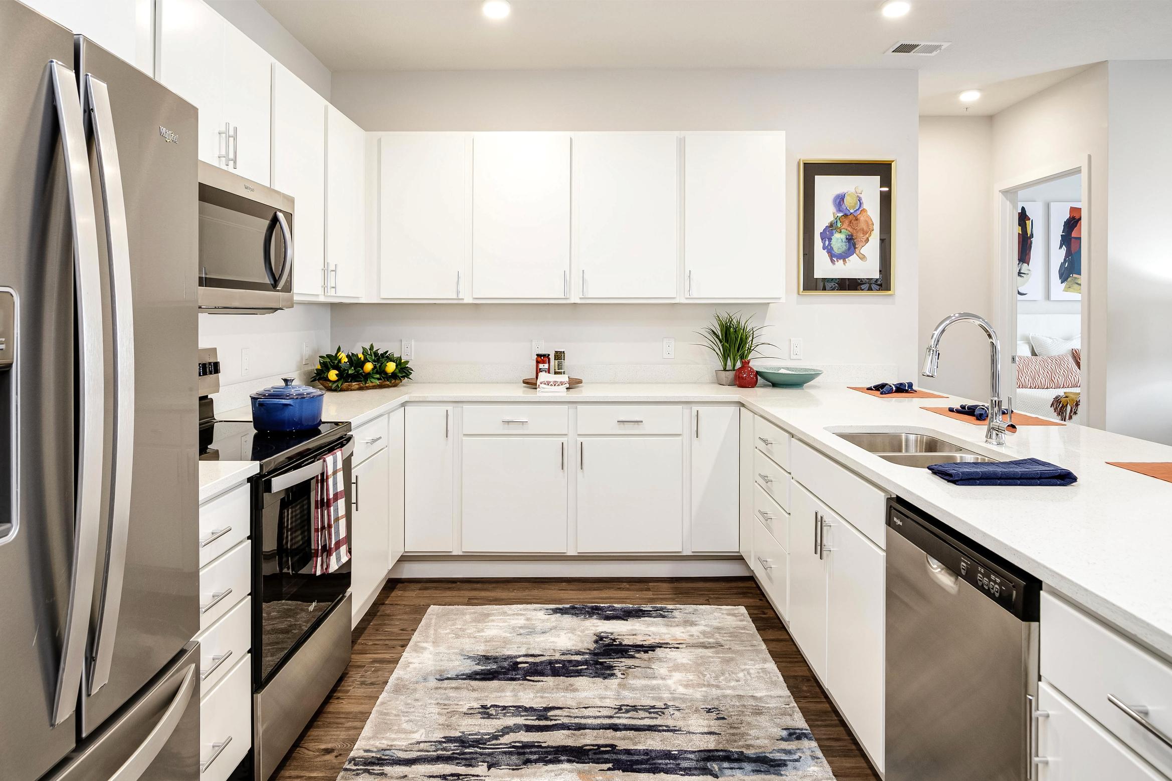 kitchen with white cabinets and stainless steel appliances