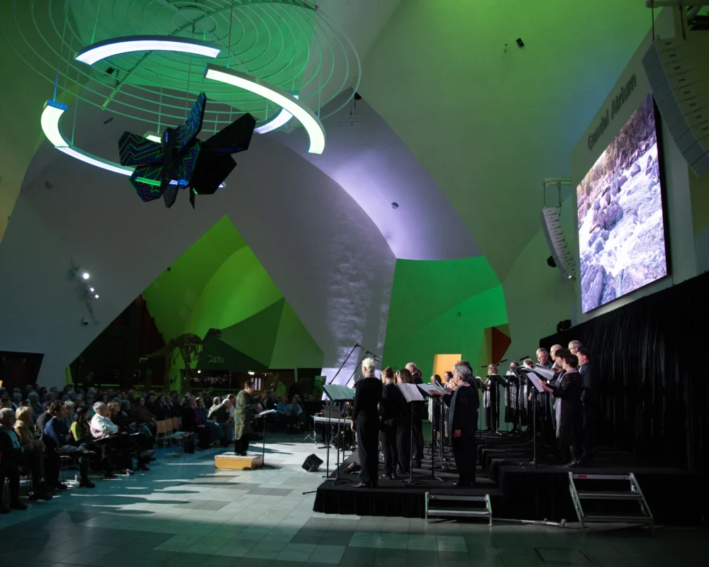 Nearing the end of the Program with a rousing rendition of 'Let the River Run'. Photo credit: Ben Curry