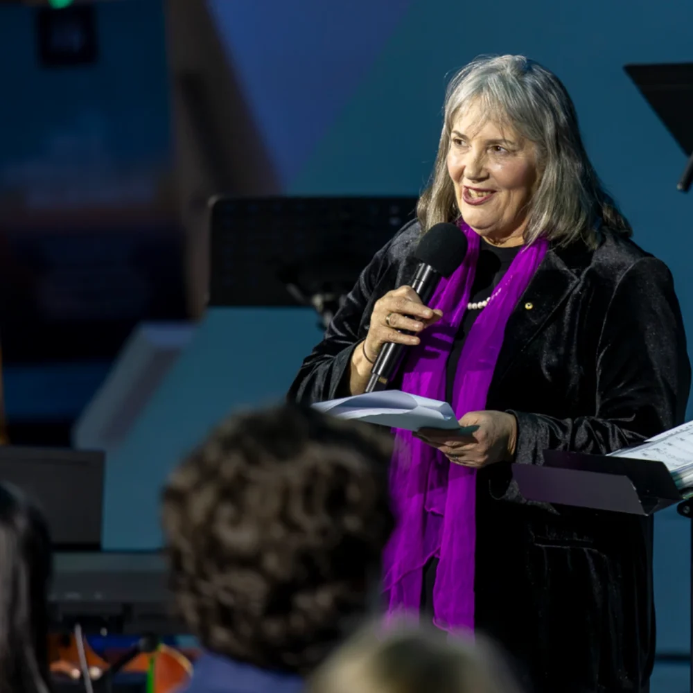 MC for the night, acclaimed journalist Alex Sloan excitedly introduced our guests to the Riversong experience. Photo credit: Dalice Trost