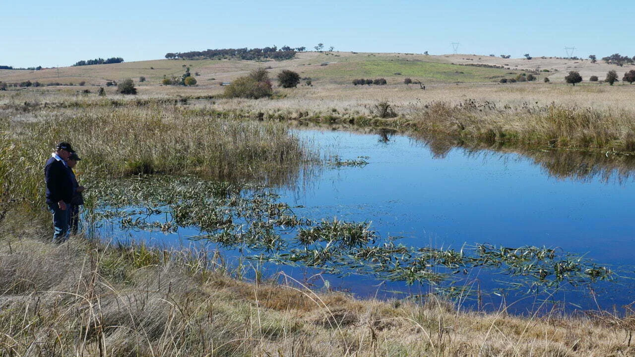 The Gibsons at their 5,000 acre property, with one of the last remaining ‘chain-of-ponds’ systems. Photo credit: Richard Snashall.