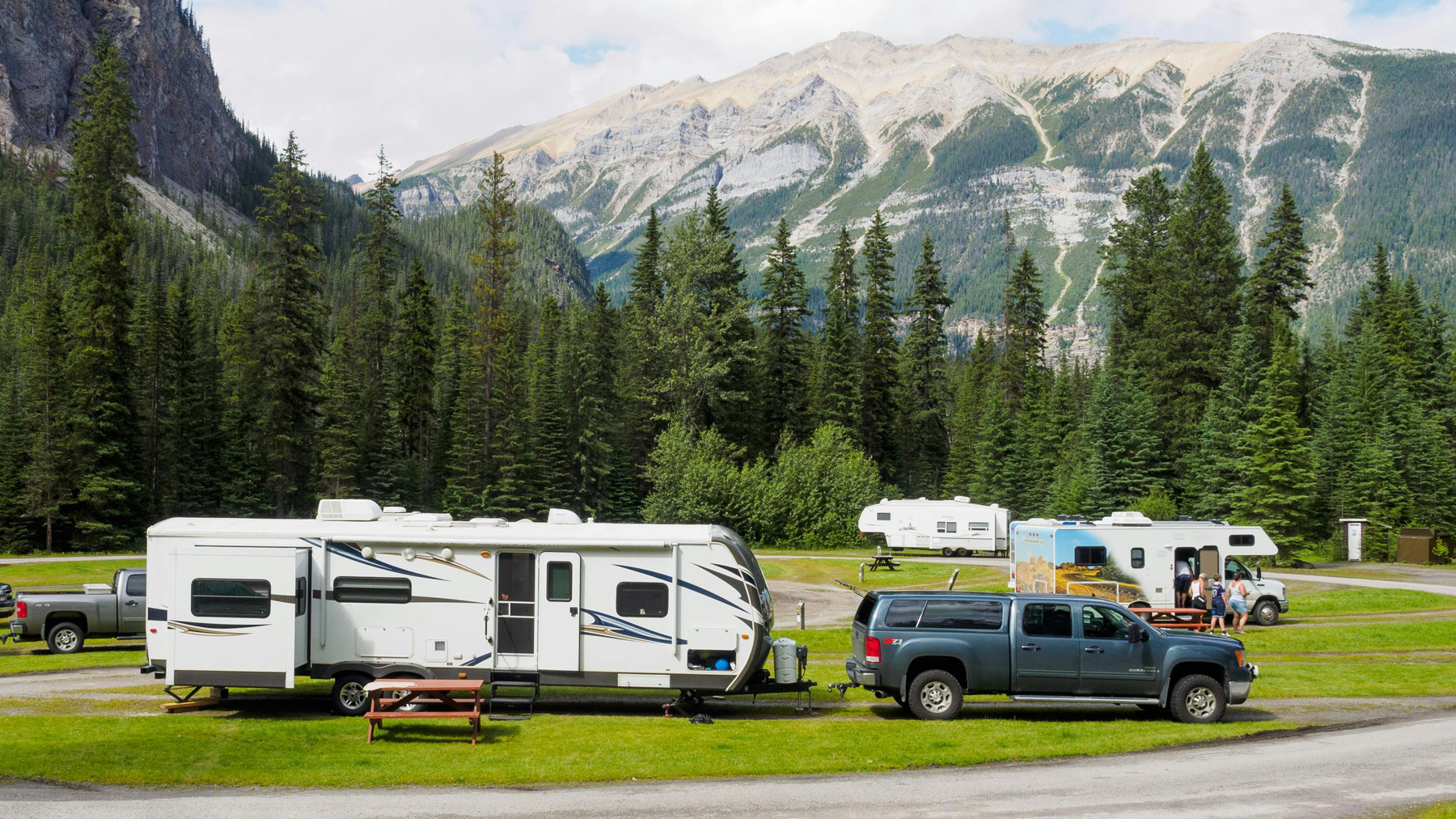 Maintenance and repair services for travel trailers like the one hooked to this Chevy Silverado.