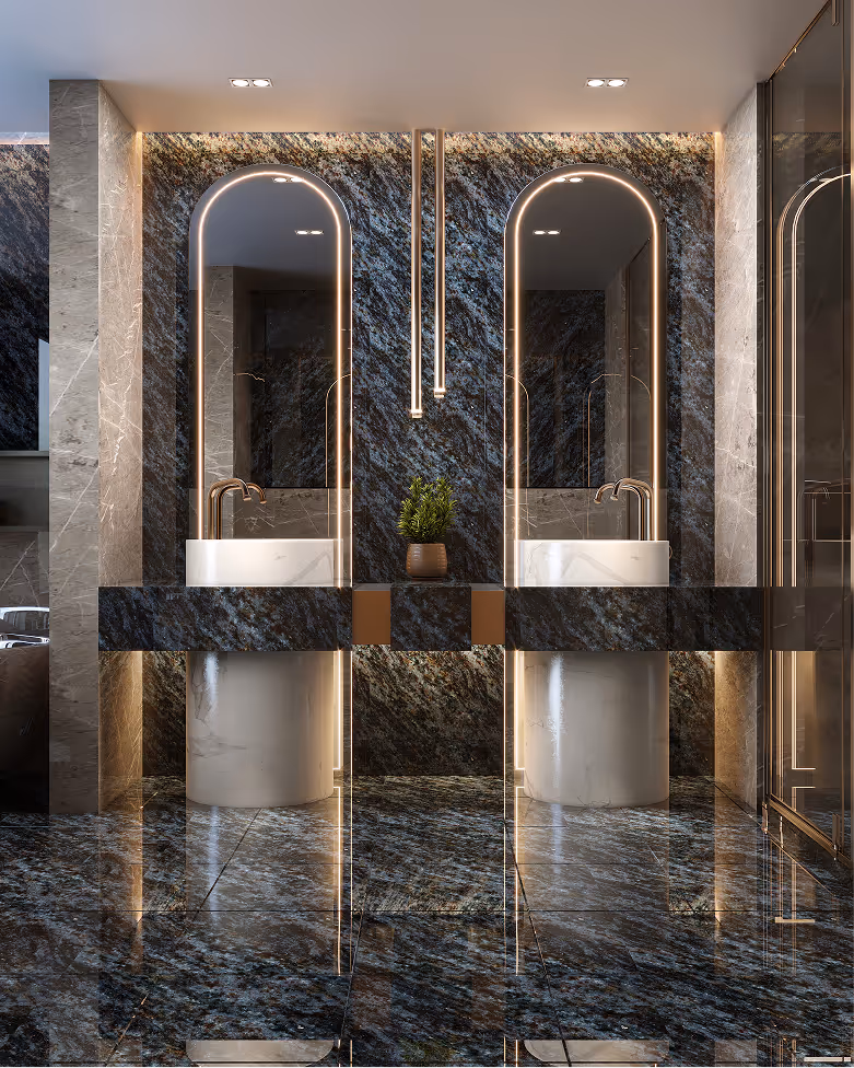 Modern double sink bathroom with dark marble walls and floors, illuminated arched mirrors, and hanging pendant lights.