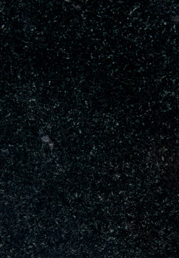 Close-up of polished black granite surface with fine white and gray speckles.