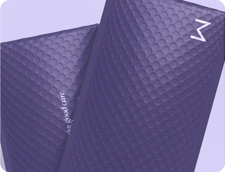 Two purple bubble mailer envelopes overlapping on a light purple background.