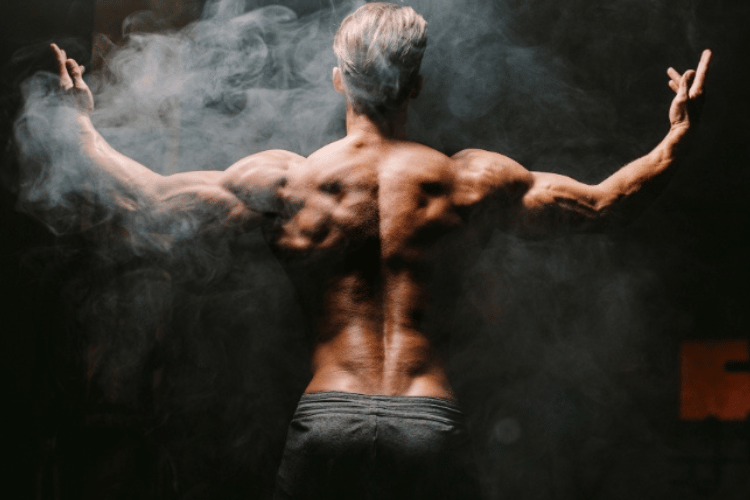 Muscular man demonstrating lean muscle development and gradual improvements in body composition.