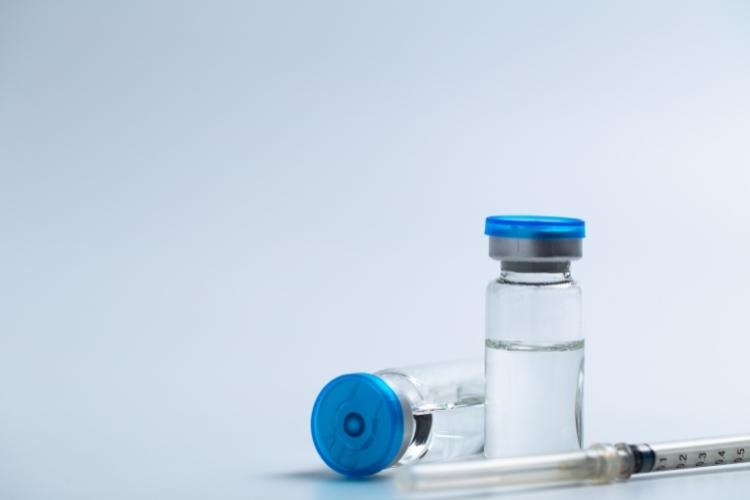Vial and syringe.