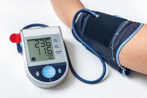 Checking blood pressure with a digital monitor.