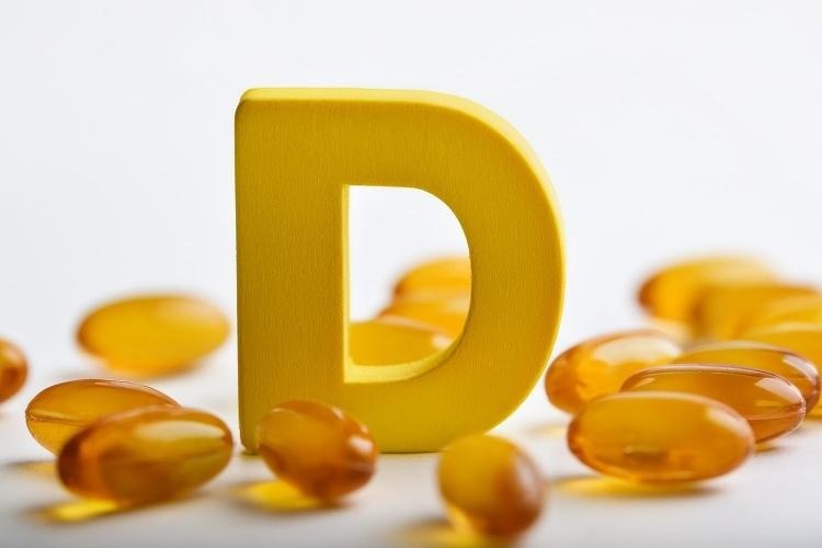 Abstract Vitamin D with pills