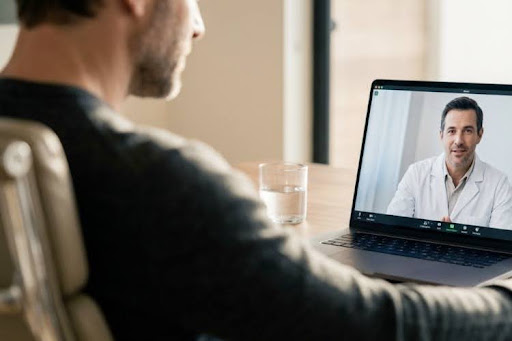Man having an online doctor consultation.