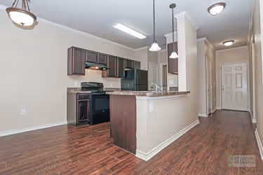 Dining area with view of kitchen and living area