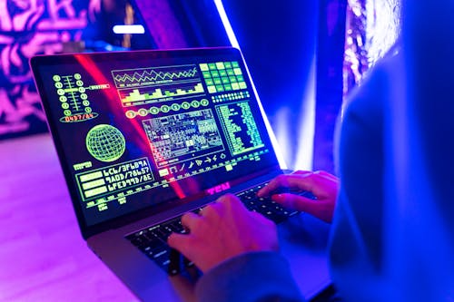 close up shot of a person using a laptop