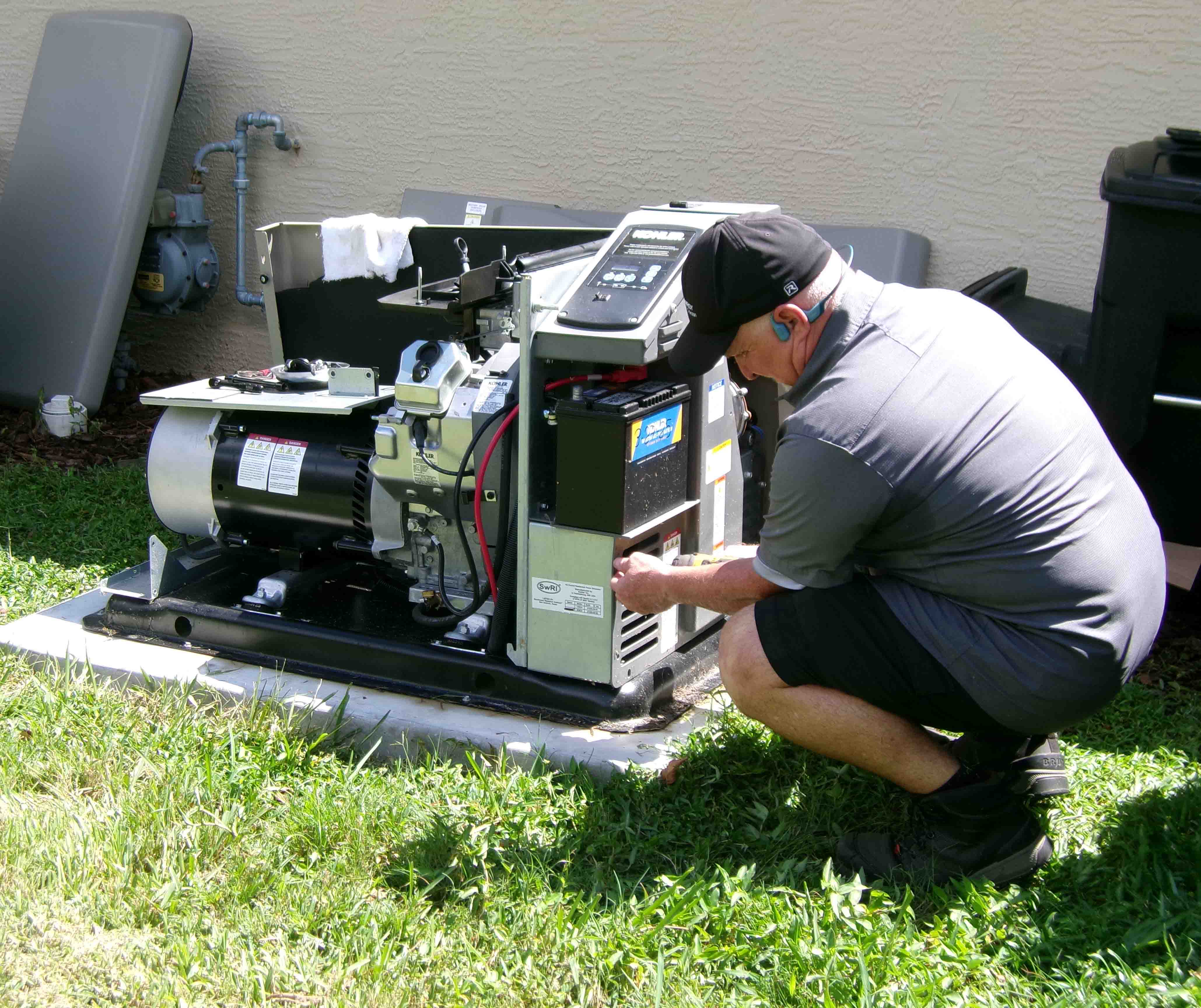 Air & Energy technician performing Kohler generator maintenance